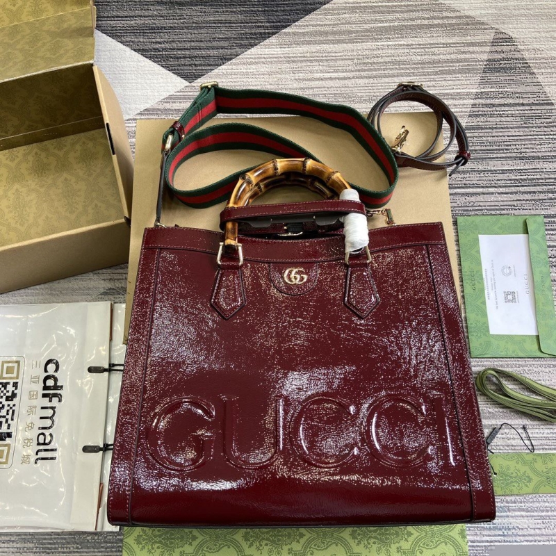 G*u*i top handle bags